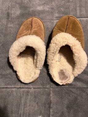 Well loved womans slippers